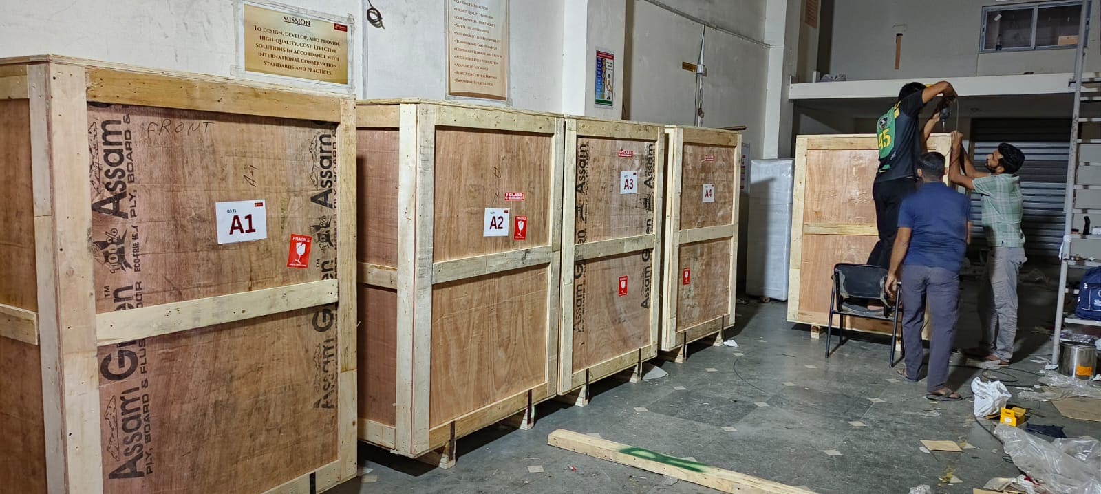 Row of large timber packing crates prepared for heavy item transport
