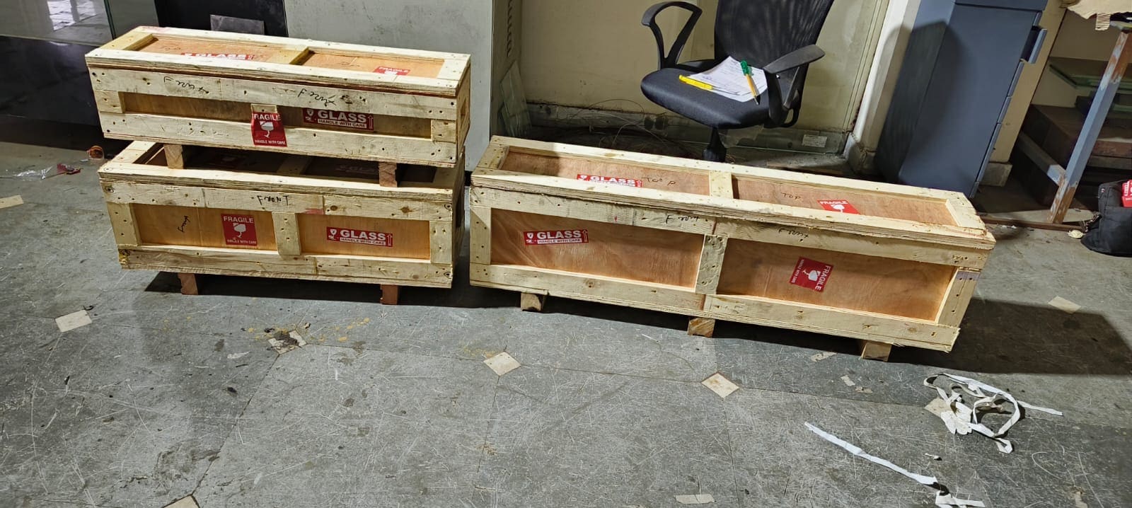 Timber crates being assembled on site for heavy item packing
